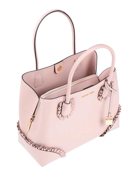 Whether you&x27;re looking for a crossbody bag or backpack that. . Light pink michael kors purse